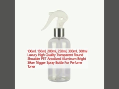 100ml, 150ml, 200ml, 250ml, 300ml, 500ml Luxury High Quality Transparent Round Shoulder PET Anodized Aluminum Bright Silver Trigger Spray Bottle For Perfume Toner